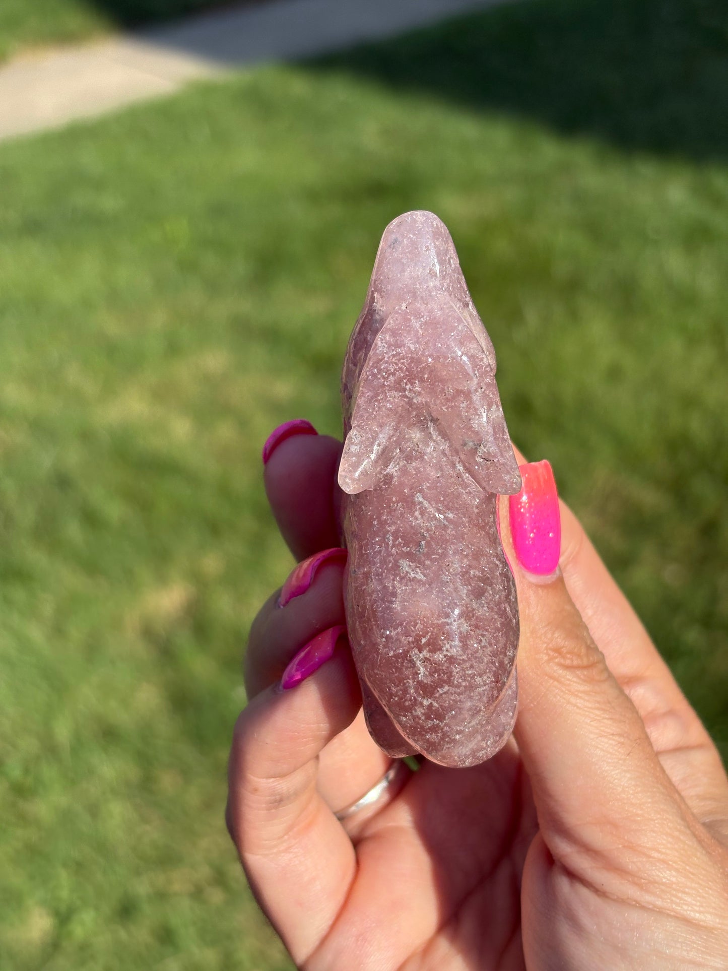 Pink amethyst wolf carving from Brazil