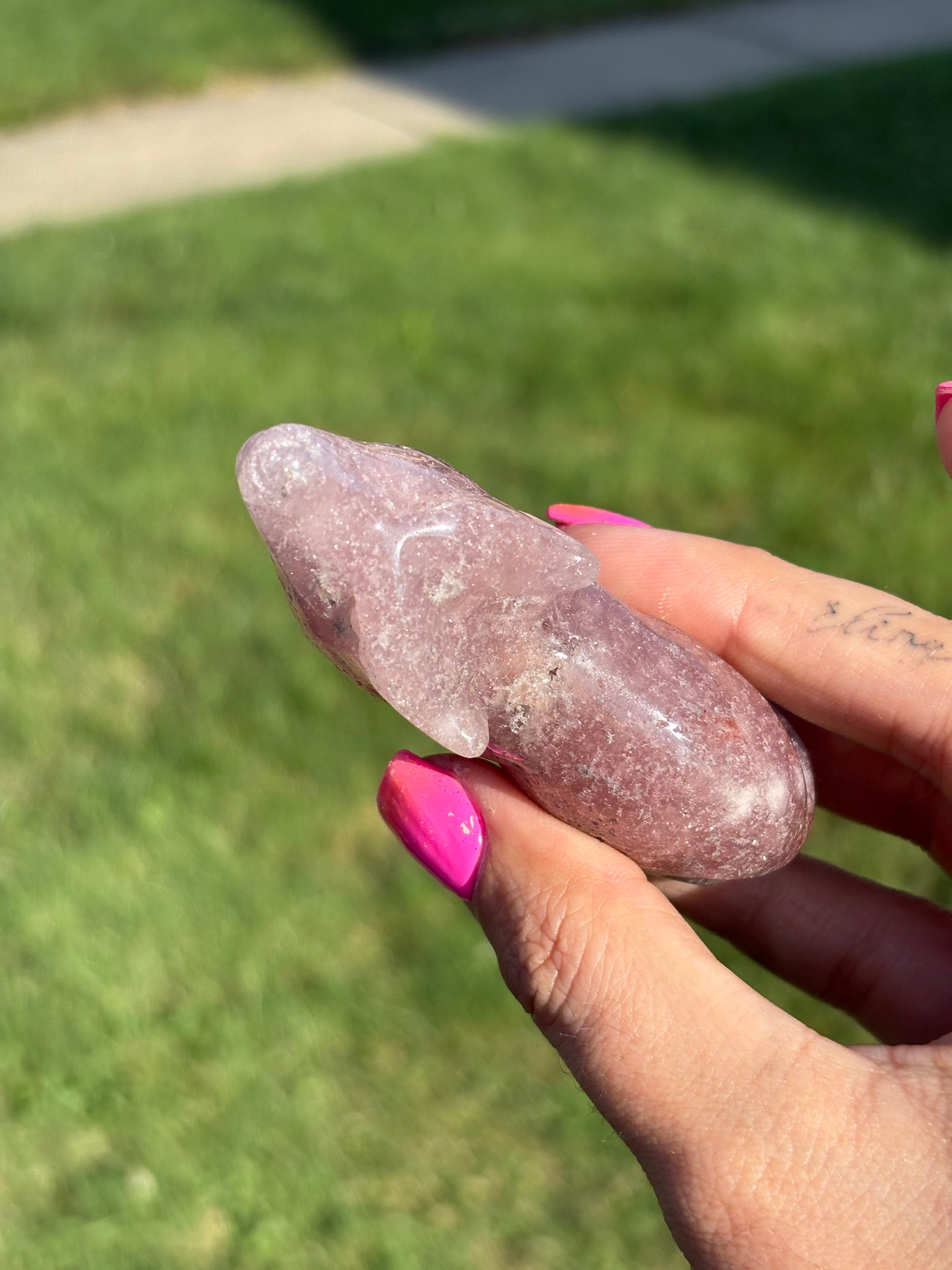 Pink amethyst wolf carving from Brazil