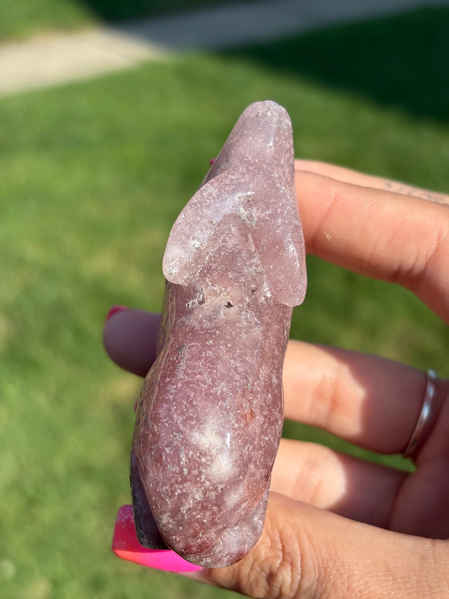 Pink amethyst wolf carving from Brazil