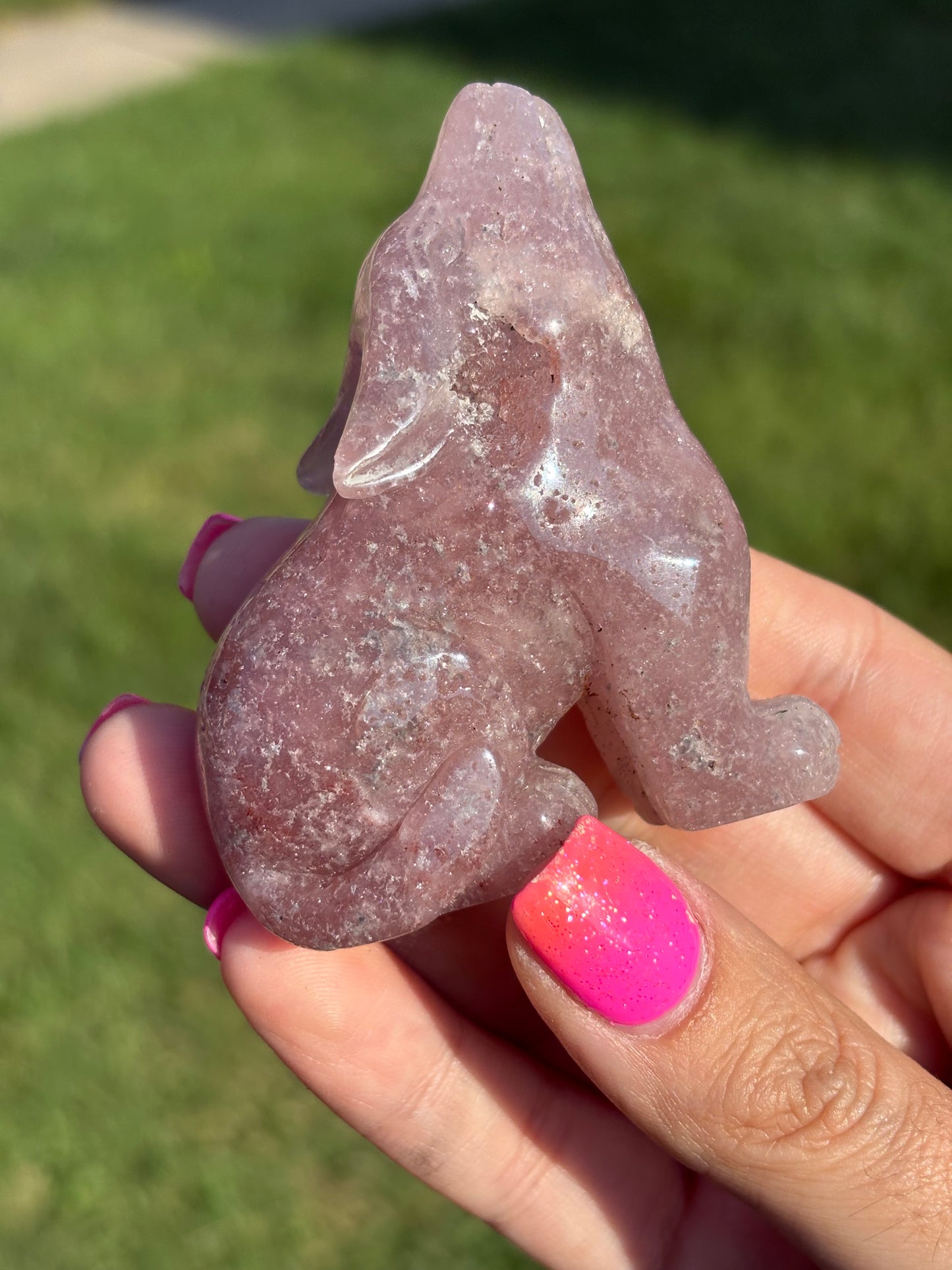 Pink amethyst wolf carving from Brazil