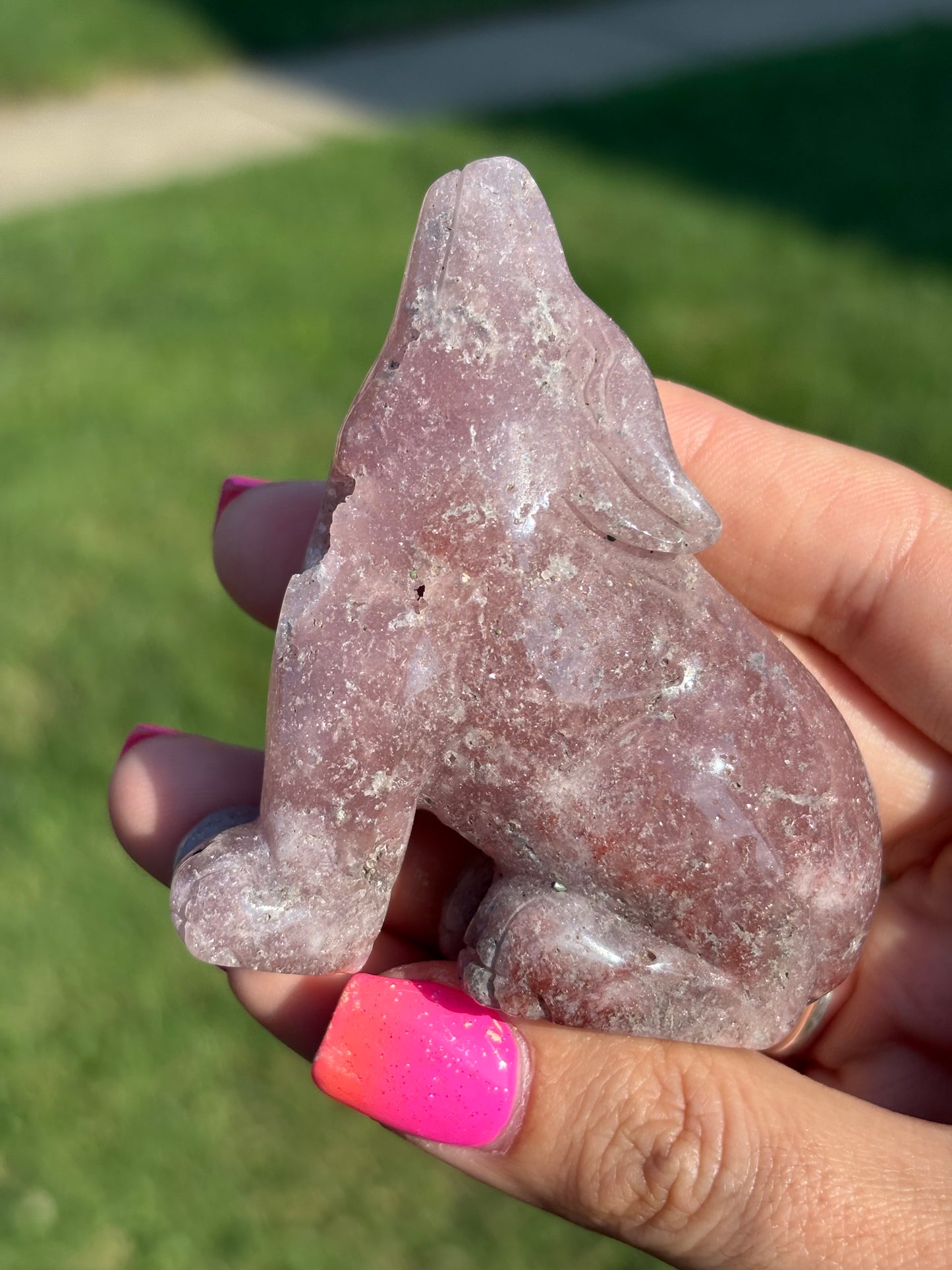 Pink amethyst wolf carving from Brazil