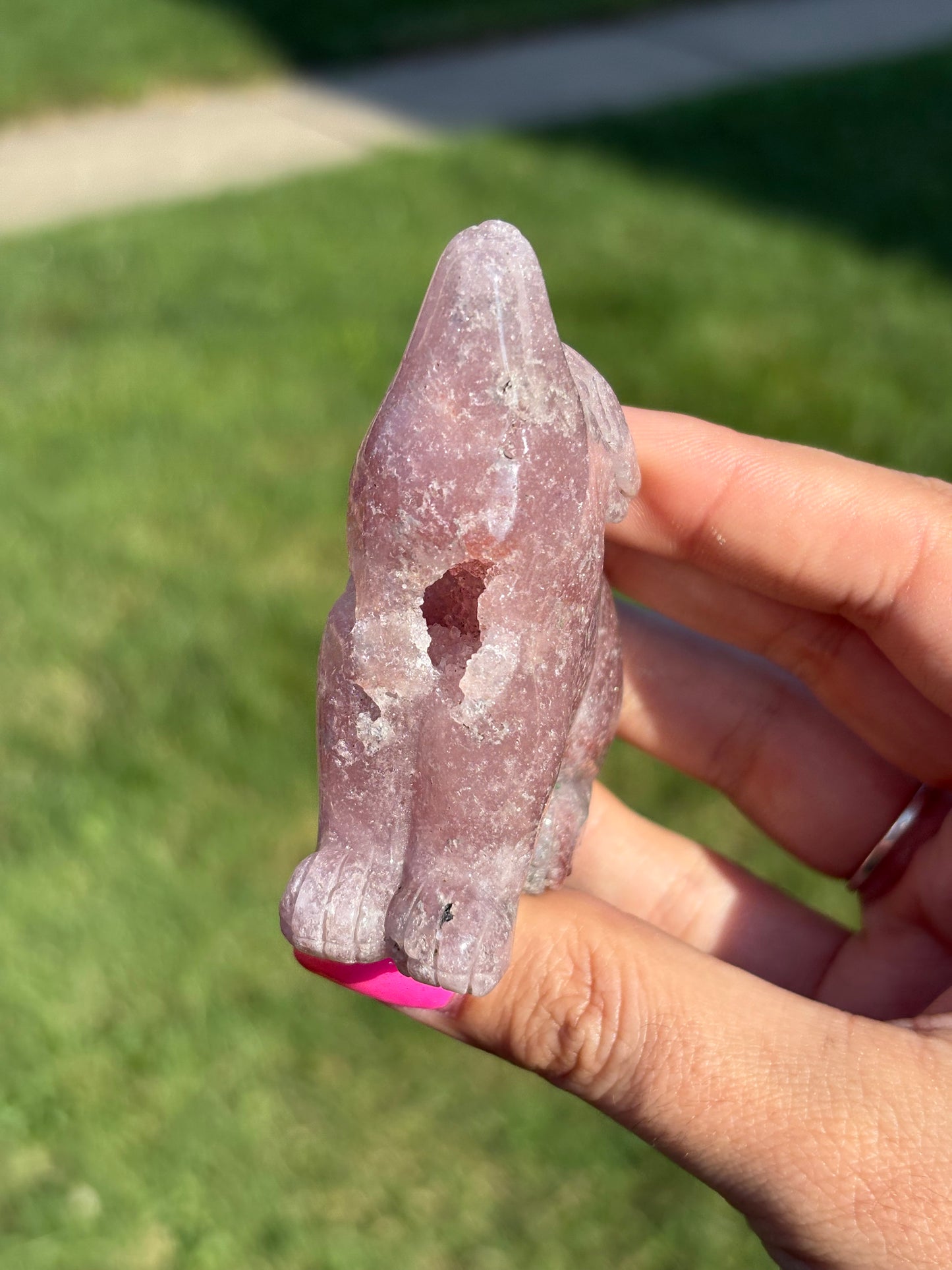 Pink amethyst wolf carving from Brazil