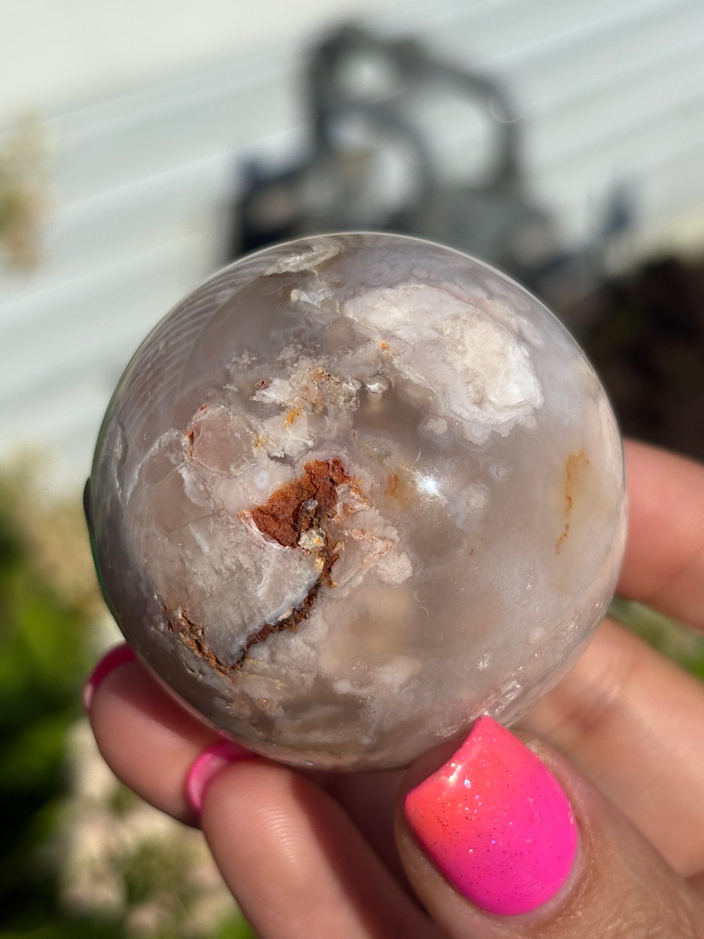 Moody flower agate sphere
