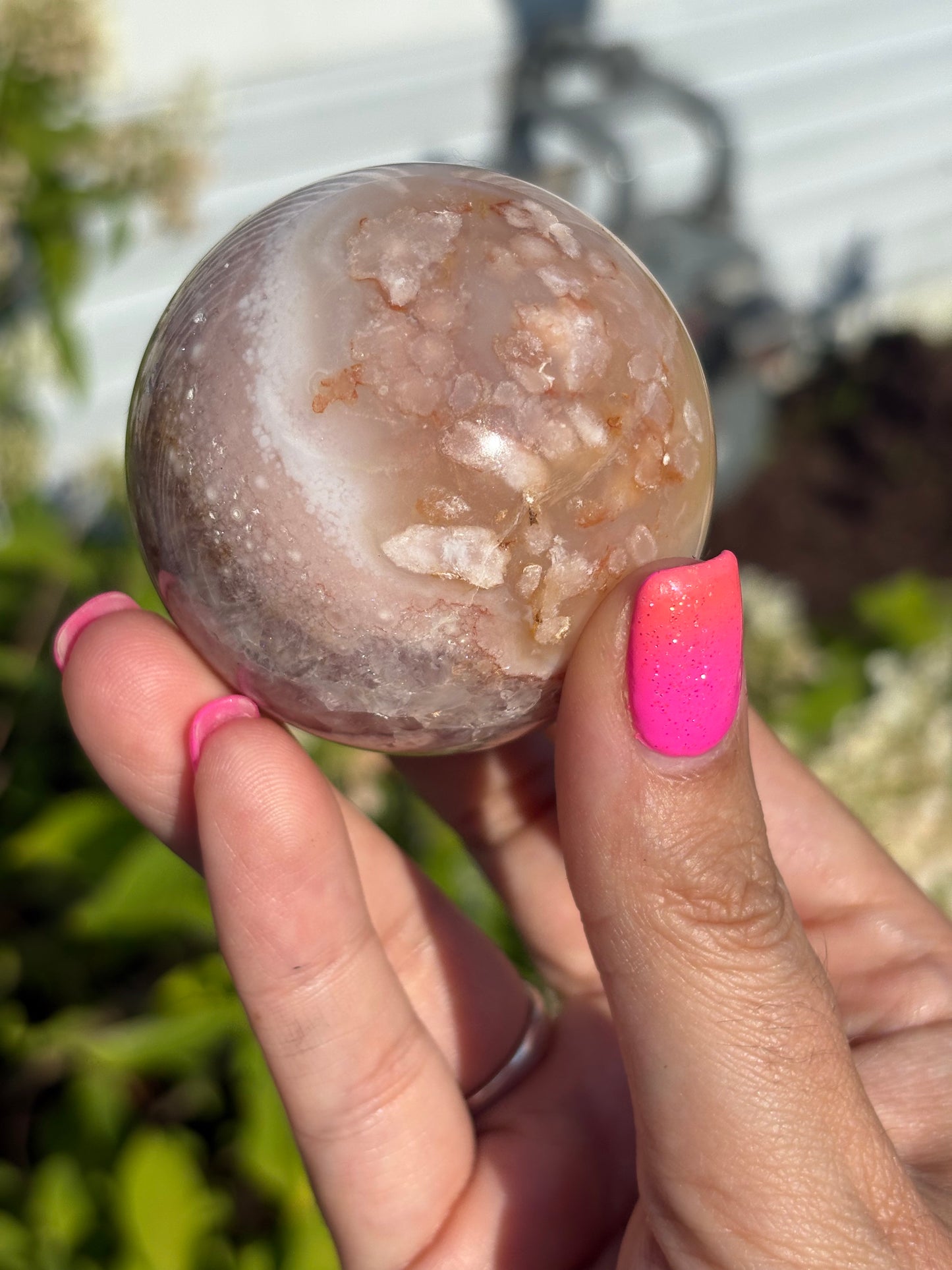Gemmy pink flower agate sphere