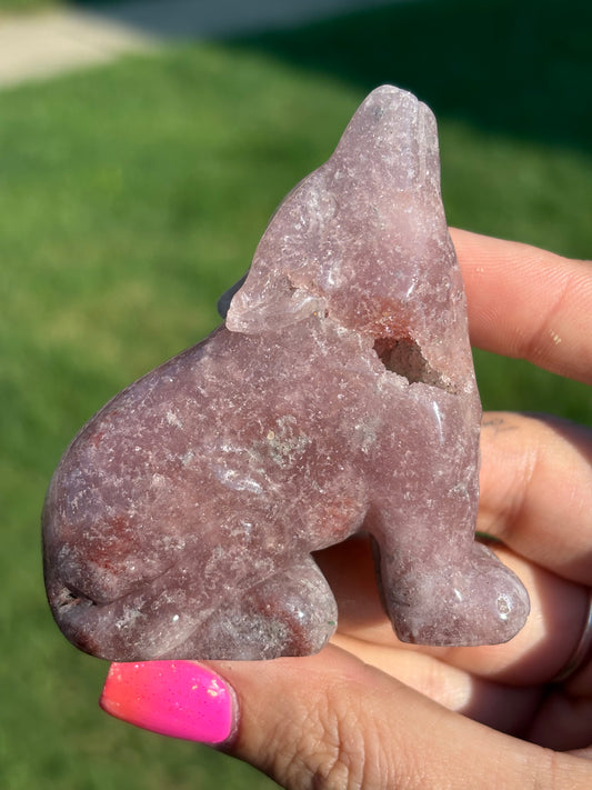 Pink amethyst wolf carving from Brazil