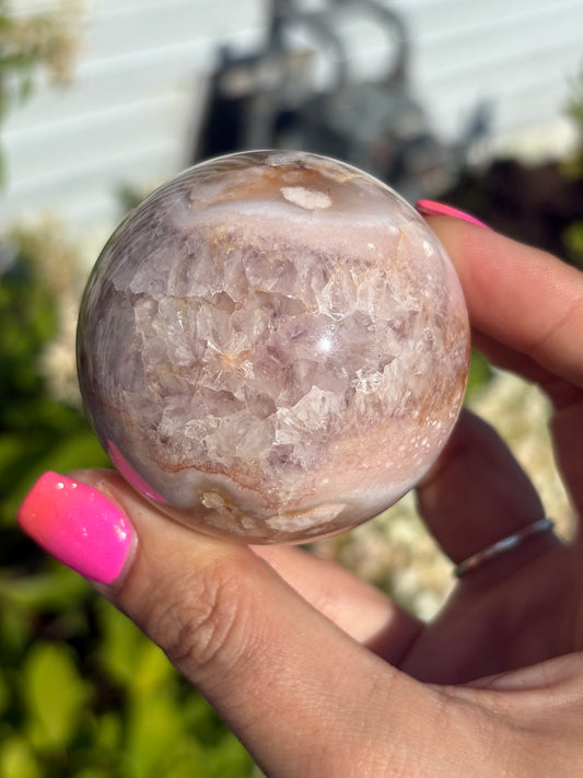 Gemmy pink flower agate sphere