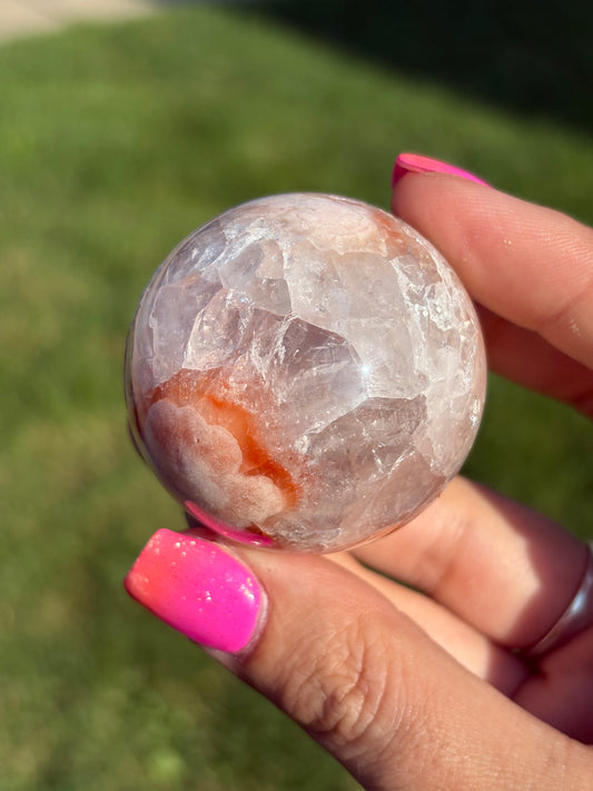 Rainbow filled pink amethyst sphere