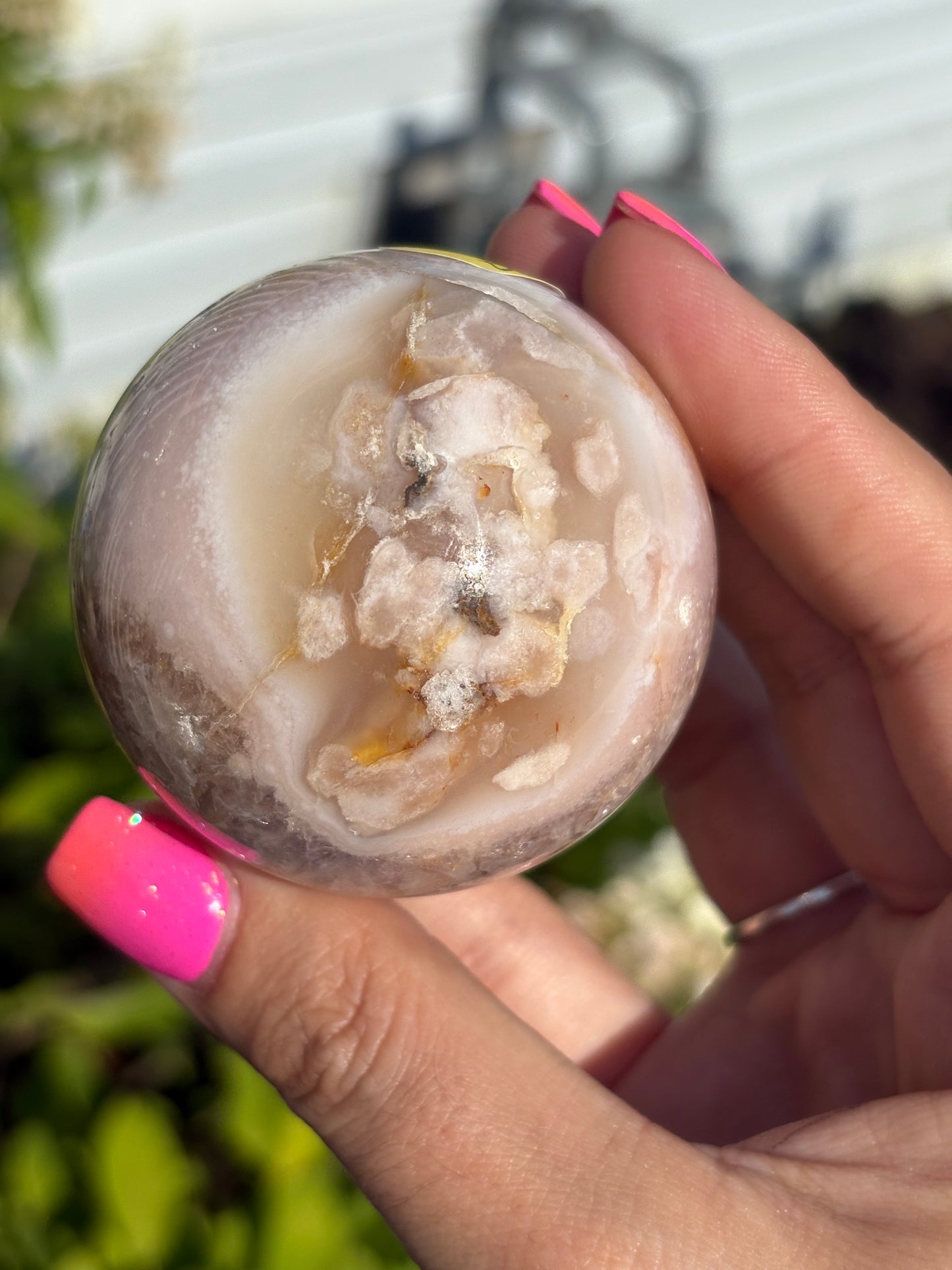 Gemmy pink flower agate sphere