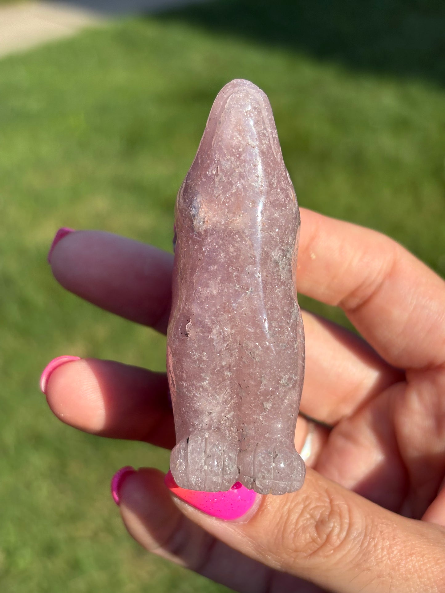 Pink amethyst wolf carving from Brazil