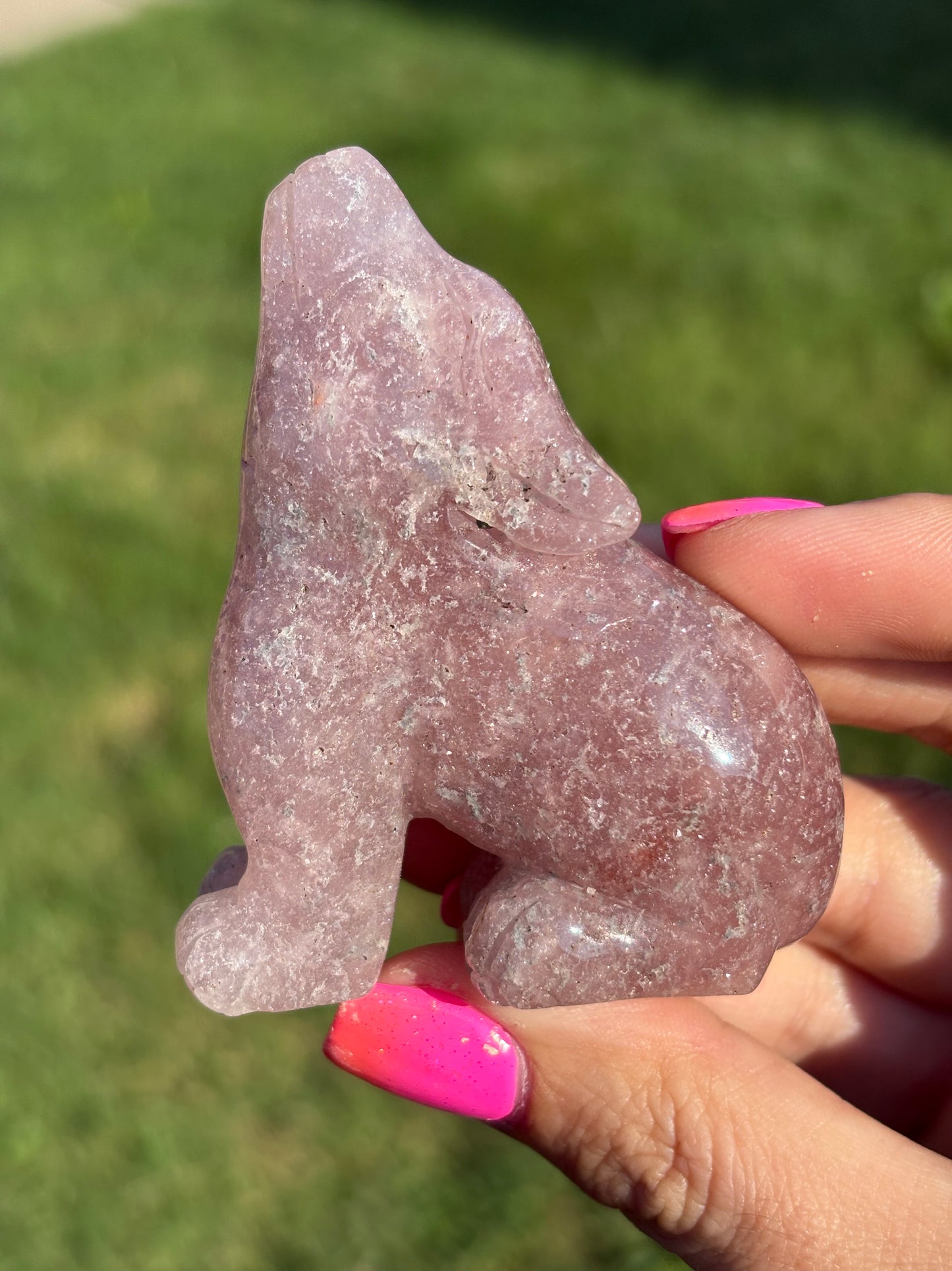 Pink amethyst wolf carving from Brazil